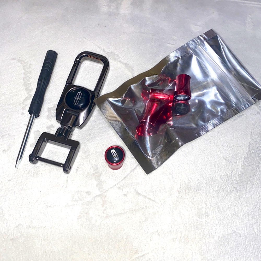 ᒪIᑎᑕOᒪᑎ Key Chain and Tire Caps
